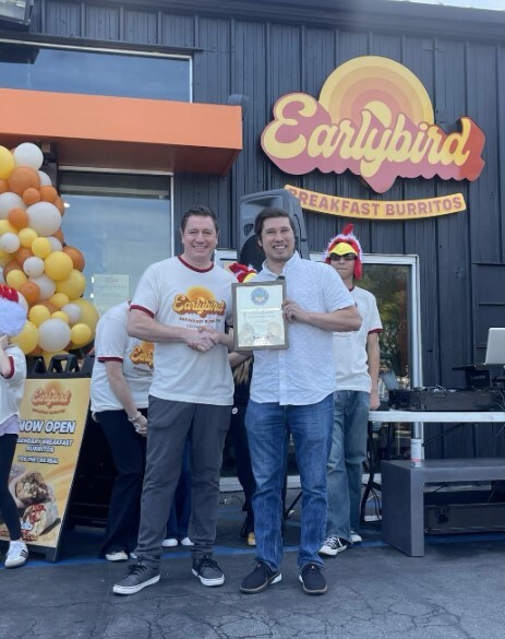 Presenting a certificate of recognition to Earlybird Breakfast Burritos   