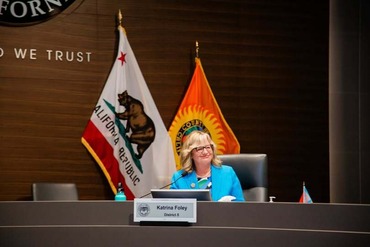 OC Supervisor Katrina Foley at the dais