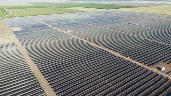 EBCE's solar project has rows of solar panels in an arid desert setting