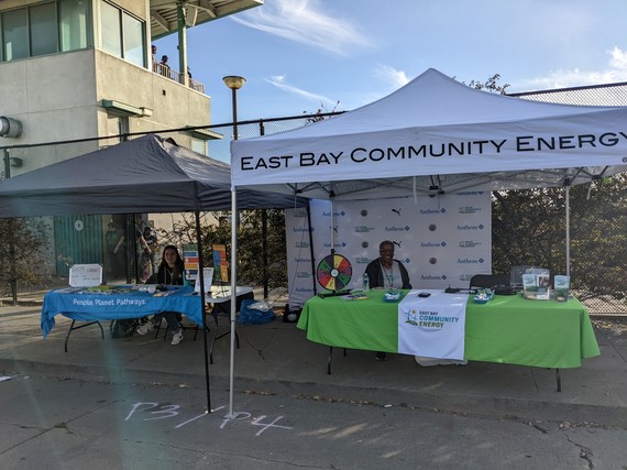 EBCE and Rising Sun Center for Opportunity at their exhibit booths outside the Oakland Roots game