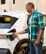 Man charging ev