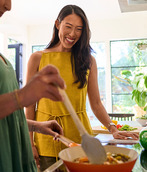 friends using induction stovetop