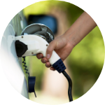 Hand Plugging in Electric Vehicle Charger