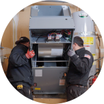 an image of contractors installing a heat pump space heating and cooling system
