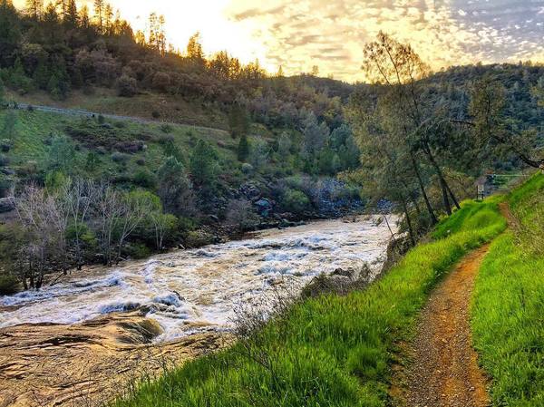 Bike trail next to a flowing river
