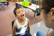 child getting dental screening