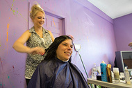 woman getting her hair cut