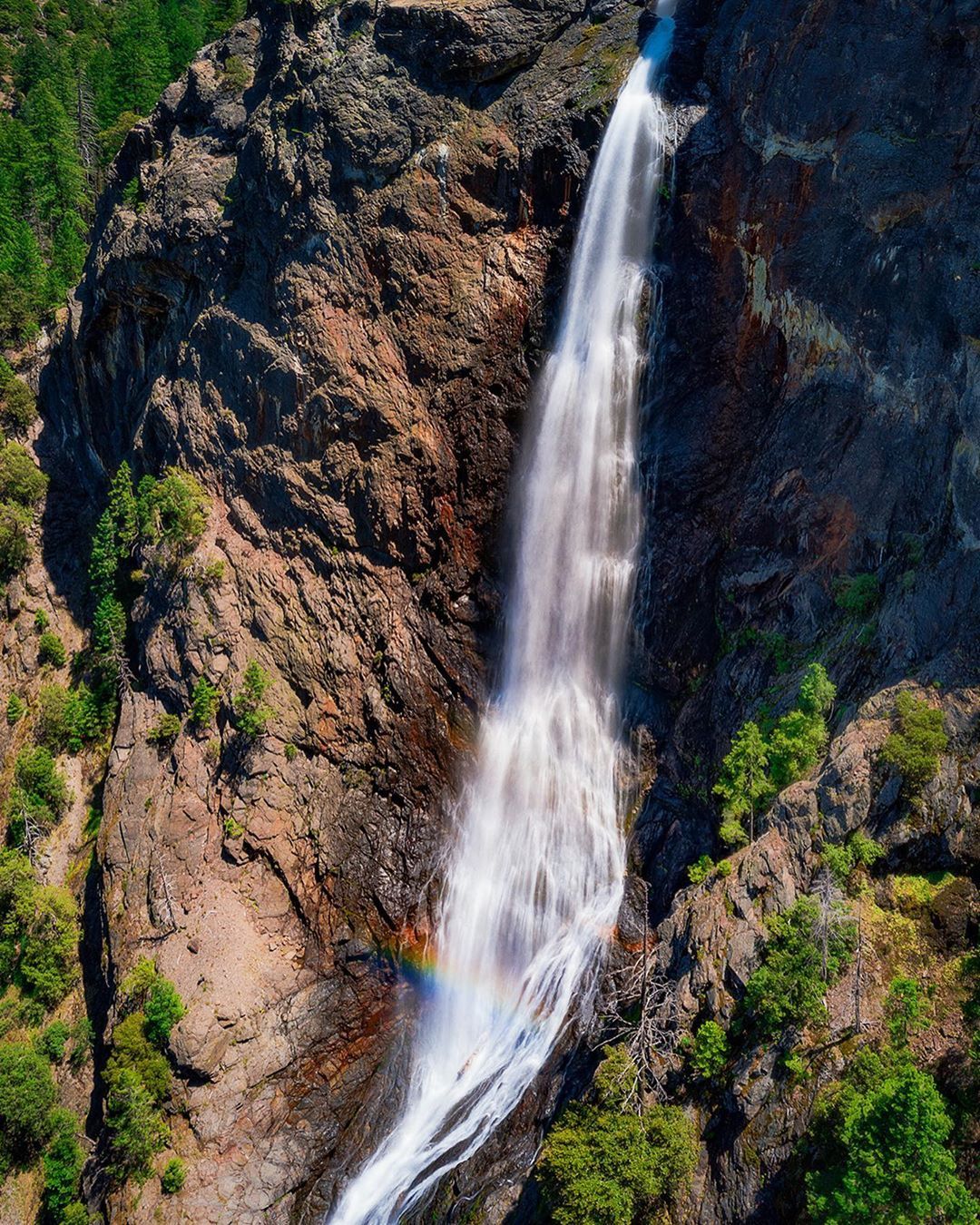 Areal photo of a waterfall. 