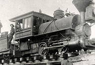 Old steam engine locomotive in motion
