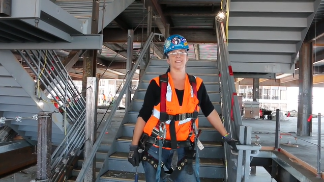 Woman standing on stairwell