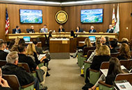 Photograph of community member addressing Placer County Board of Supervisors in their Auburn chambers