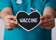 Vaccine heart held by doctor