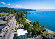 North Lake Tahoe, beautiful blue sky and lake with overview of roads and green trees