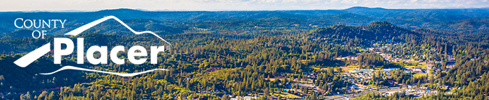 Highway 80 ascends through rolling green hills into the Sierra 
