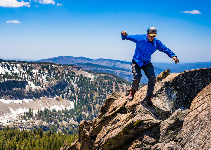 Man rock hopping along Twin Peaks in Lake Tahoe
