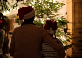 Couple looking at a Christmas Tree