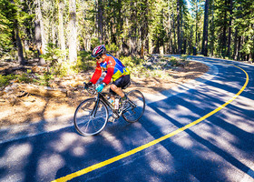 A bicyclist rides on Martis Valley Trail in Tahoe. 