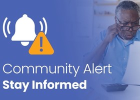 Panic man with text overlay "Community Alert. Stay Informed"
