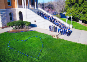 blue pinwheels placed in the shape of a heart