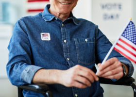 Man holding American Flag
