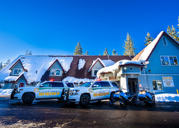 Placer County Sheriff vehicles park in front of Tahoe substation