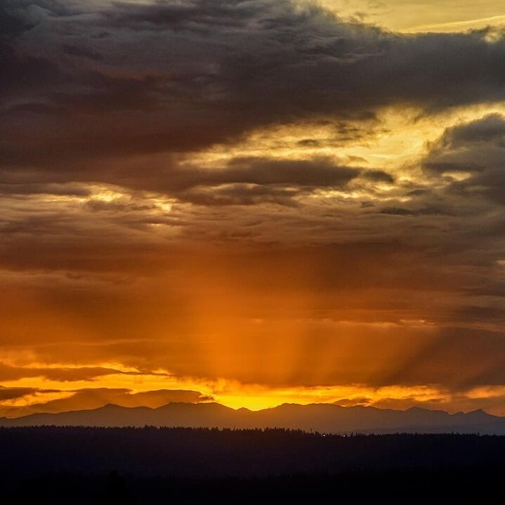 A golden sunrise over mountain ridge in Weimar