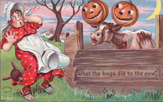 A postcard from Halloween 1914 shows a mother looking worriedly at their cow after discovering that her children had put Jack-o'-lanterns on its horns