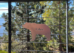 Personalized bear plaque with text reading "Tahoe"