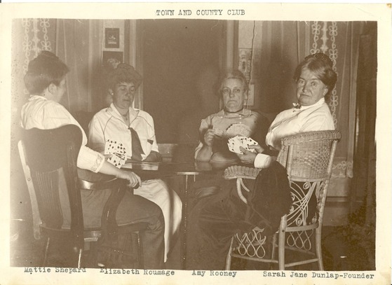 Elisabeth Roumage plays cards with a group of women at the Town and Country Club