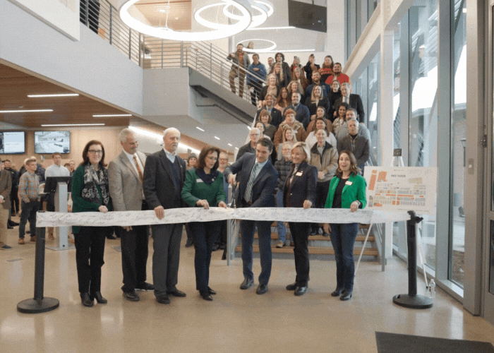 Placer County dignitaries cut an employee-signed ribbon for the new Health and Human Services Center unveiling