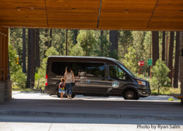 Woman and child use a TART Connect vehicle to travel Tahoe