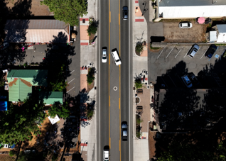 An aerial image of a car turning into a parking lot in North Lake Tahoe. 