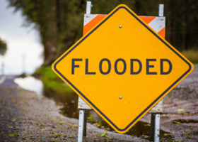 Flooded road sign