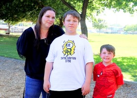 An image of a Lincoln mom and kids. 