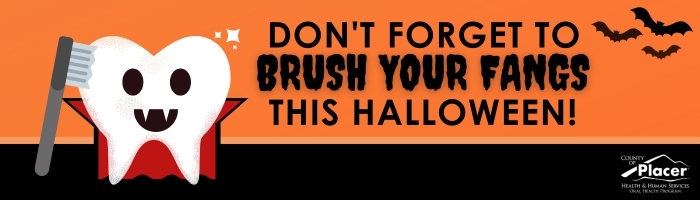 Image of a cartoon tooth with vampire teeth and a toothbruch with text: don't forget to brush your fangs this halloween