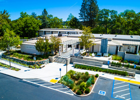 Drone photo of the front of the Auburn Library on a sunny day