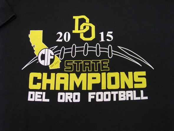 Front of a black tee shirt reading Del Oro Football state champions 2015