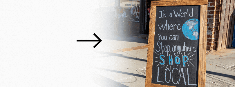 A sign that says Shop Local