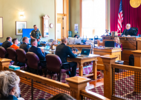 A photo captured from the vantage point of family members looking towards the judge during the sentencing of Carson Schewe