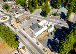 An aerial view of parallel streets through the forested mountain town of Kings Beach