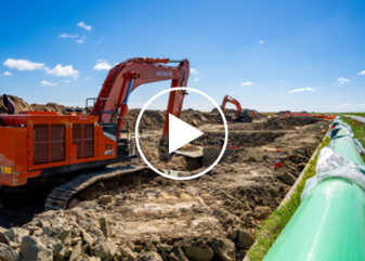 Construction equipment digging trenches to lay infrastructure pipe in West Placer