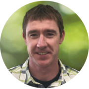 A profile image of Tim Cussen from the Placer County housing team with dark brown hair, a light-colored shirt and a green background.