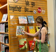 A person looking at books