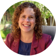 A profile image of Lindsay Romack in a red jacket with a green background.