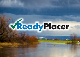 Flooded street with rain clouds. Overlay text reads Ready Placer