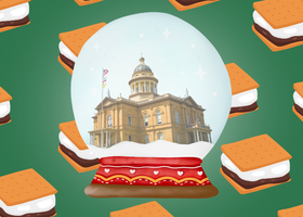 Snow globe with museum inside and s’more in the background