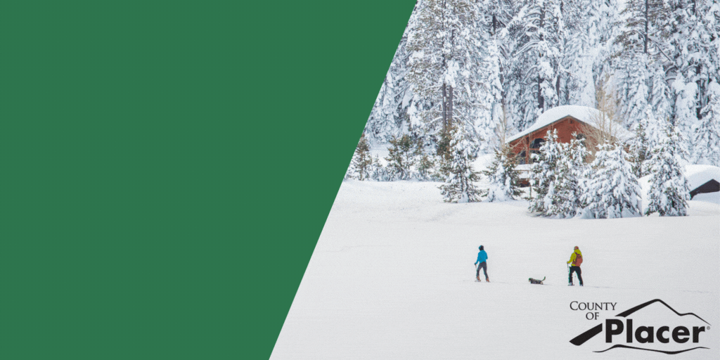 A snowy photo of hikers near a home with the county logo and text: Hotline, short-term rental complaint? Call our 24/7 hotline at: 530-448-8003