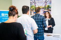 People in line to speak with representative from the Business Advantage Network