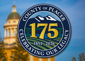 Logo of the Placer County 75th anniversary placed over a blurred Placer County historic courthouse