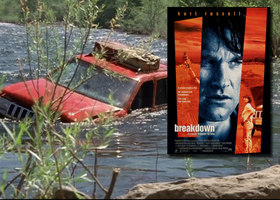 A screen capture from the 1997 movie Breakdown of a red jeep in the American River with an overlay of the black and red movie poster.